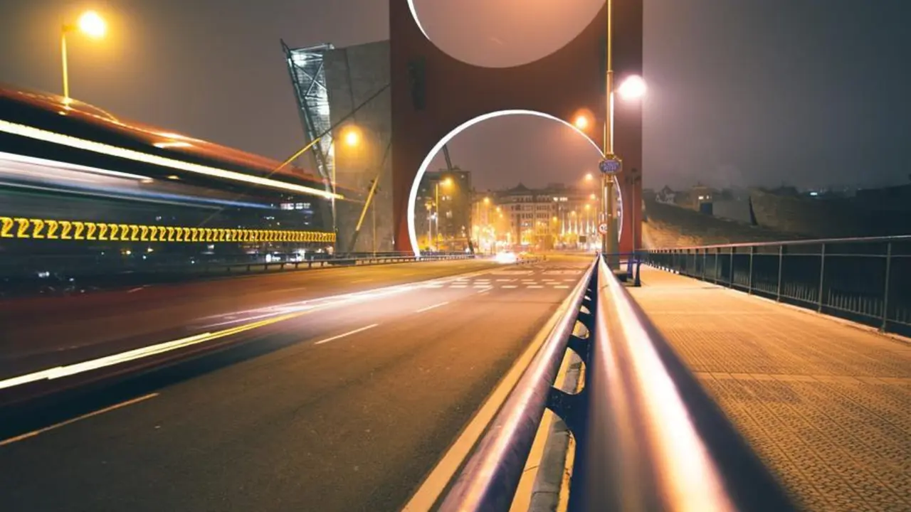plano general puente salve noche luces autopista arco puente unico bilbao espana scaled